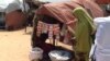 A small, woman-run store at the Hidaya Camp, on the outskirts of Mogadishu, sells detergent to wash clothes, small packets of coffee, charcoal and candy. 