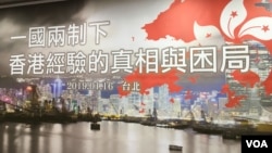 Netherlands' Tim van Rijthoven and Georgia's Nikoloz Basilashvili compete in a third round Wimbledon match at the All England Lawn Tennis and Croquet Club, London