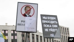 去年12月24日莫斯科反政府示威
标语1：“俄罗斯不要普京”
标语2：“只要他们不下台，我们还会示威”