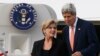 U.S. Secretary of State John Kerry (R) steps off his aircraft alongside Australia's Foreign Minister Julie Bishop in Sydney, August 11, 2014.