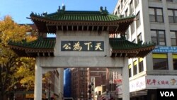 Malaysian ethnic Chinese child reacts to the camera as others light candles during a vigil for missing Malaysia Airlines passengers at the Independence Square in Kuala Lumpur. 