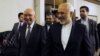 Sartaj Aziz, left, adviser to Pakistan's prime minister on foreign affairs, escorts Iranian Foreign Minister Javad Zarif to their meeting at the Foreign Ministry in Islamabad, April 8, 2015. 