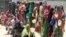 Internally displaced Somali women stand in a queue waiting for relief food to be served in Hodan district south of capital Mogadishu September 5, 2011. 