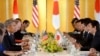 U.S. President Barack Obama speaks to Japanese Prime Minister Shinzo Abe (R) during their meeting at the Akasaka Palace in Tokyo, April 24, 2014.