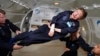 Stephen Hawking, almost totally paralyzed since 1970 by ALS, enjoys a few moments of weightlessness during a flight aboard Zero Gravity Corp.’s modified Boeing 727. (Jim Campbell, Aero-News Network)