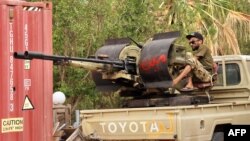 Fighters loyal to the UN-recognised Libyan Government of National Accord (GNA) are pictured during clashes with forces loyal to strongman Khalifa Haftar in an area south of the Libyan capital Tripoli on June 1, 2020.