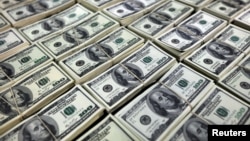 FILE - Residents of the United States scored an unimpressive 14th place in world rankings of financial literacy.