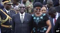 President Robert Mugabe and his wife, Grace.