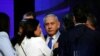 Israeli Prime Minister Benjamin Netanyahu looks on after speaking to supporters at his Likud party headquarters following the announcement of exit polls during Israel's parliamentary election in Tel Aviv, Sept. 18, 2019. 