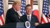 FILE - President Donald Trump, left, speaks as South Korean President Moon Jae-in looks on during a joint news conference at the Blue House in Seoul, South Korea, Nov. 7, 2017.