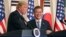 FILE - President Donald Trump, left, speaks as South Korean President Moon Jae-in looks on during a joint news conference at the Blue House in Seoul, South Korea, Nov. 7, 2017.