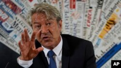 Roberto Mignone, coordinator for Libya of the UN Refugee Agency, UNHCR, talks to reporters during a press conference on the refugees situation on Libya, in Rome, Friday, July 6, 2018. 