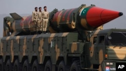 FILE - A Pakistani-made Shaheen-III missile, capable of carrying nuclear warheads, is displayed during a military parade in Islamabad, March 23, 2022. 