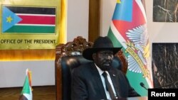 FILE - South Sudan's President Salva Kiir attends the oath-taking ceremony of his vice presidents at the State House in Juba, South Sudan, Feb. 22, 2020.