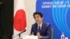 In this handout photograph received by Jiji Press and released by Japan's Cabinet Public Relations Office, Japan's Prime Minister Shinzo Abe speaks from Tokyo with other Asean leaders during a video conference on April 14, 2020. - Leaders of Japan,…