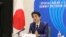 In this handout photograph received by Jiji Press and released by Japan's Cabinet Public Relations Office, Japan's Prime Minister Shinzo Abe speaks from Tokyo with other Asean leaders during a video conference on April 14, 2020. - Leaders of Japan,…