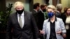 FILE - European Commission President Ursula von der Leyen welcomes British Prime Minister Boris Johnson in Brussels, Belgium, Dec. 9, 2020.