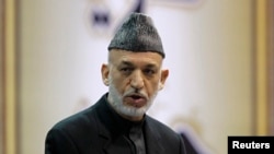 21일 아프가니스탄 카불에서 원로 지도자 모임인 '로야 지르가'가 열린 가운데,하미드 카르자이 대통령이 연설을 하고 있다.