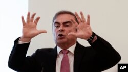 FILE - Nissan's former chairman Carlos Ghosn speaks at a press conference in Beirut, Lebanon, Jan. 8, 2020. 