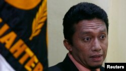 Eksekutif Partai Keadilan Sejahtera (PKS) dan Menteri Komunikasi dan Informatika Tifatul Sembiring. (Reuters/Crack Palinggi)