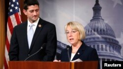 2013年12月10日，众议院预算委员会主席、共和党人保罗•瑞恩（左）与参议院预算委员会主席、民主党人帕蒂•默里举行记者会，宣布达成预算协议。