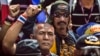 Anti-government protesters take part in a rally outside the Import-Export Bank of Thailand as protesters forced the evacuation of its employees in central Bangkok, Jan. 17, 2014. 