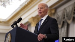 美国总统拜登2025年1月13日在位于华盛顿的美国国务院总部发表讲话。