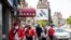 Wally Ng, a member of the Guardian Angels, patrols with other members in Chinatown during the outbreak of the coronavirus disease (COVID-19) in New York City, New York, U.S., May 16, 2020.