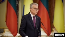 资料照：2021年3月18日，立陶宛总统瑙塞达在与乌克兰总统泽连斯基举行会晤后举行的记者会上。