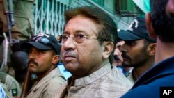 FILE - In this April 20, 2013, file photo, Pakistan's former President and military ruler Pervez Musharraf arrives at an anti-terrorism court in Islamabad, Pakistan. A Pakistani court sentenced the country's former military ruler to death in a treason cas
