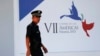 A policeman walks outside of the Atlapa Convention Center, site of the VII Summit of the Americas in Panama City, Panama, April 8, 2015. 