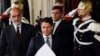Giuseppe Conte, center, arrives to address the media after meeting Italian President Sergio Mattarella, at the Quirinale presidential palace in Rome, May 23, 2018.