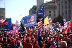 FILE - Supporters of then-U.S. President Donald Trump participate in a "Stop the Steal" protest after the 2020 U.S. presidential election was called for Democratic candidate Joe Biden, in Washington, Nov. 14, 2020.