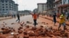 Supporters of a Guinea opposition party clash with police as they protest against president Alpha Conde on May 10, 2012 in Conakry.