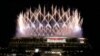 Fireworks illuminate the National Stadium during the opening ceremony of the 2020 Summer Olympics, July 23, 2021, in Tokyo.