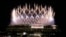 Fireworks illuminate the National Stadium during the opening ceremony of the 2020 Summer Olympics, July 23, 2021, in Tokyo.