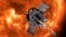 FILE - This image made available by NASA shows an artist's rendering of the Parker Solar Probe approaching the Sun. The probe made history on Tuesday, flying closer to the sun than any other spacecraft. (Johns Hopkins APL/NASA)