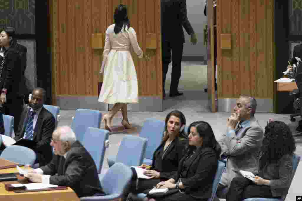 U.S. Ambassador to the United Nations Nikki Haley, top center, leaves the room as Palestinian Ambassador to the United Nations Riyad Mansour, front right, prepares to address a Security Council meeting on the situation in Gaza, at United Nations headquarters in New York.