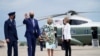 President Joe Biden waves as he and first lady Jill Biden walk to board Air Force One for a trip to Georgia to mark his 100th day in office, April 29, 2021, in Andrews Air Force Base, Md.