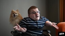 Fredrick Brennan, creator of imageboard website 8chan, speaks during an interview with AFP in Manila, Philippines, Aug. 6, 2019. 