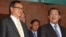 Cambodian Prime Minister Hun Sen, right, talks with the main Opposition Party leader Sam Rainsy, left, of Cambodia National Rescue Party, after their meeting in Senate headquarters in Phnom Penh, Cambodia, July 22, 2012. 
