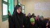 FILE - Teenage girls attend a discussion of female genital mutilation at the Sheik Nuur Primary School in Hargeisa, Somaliland, Feb. 16, 2014. 