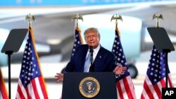 President Donald Trump speaks to a crowd of supporters at the Yuma International Airport Tuesday, Aug. 18, 2020, in Yuma, Ariz. (AP Photo/Matt York)
