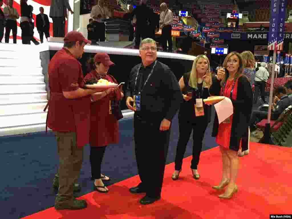 Concessions staff hand out cheese and grapes to those working on the floor of the Republican National Convention as workers prepare for Thursday night's prime-time schedule, which will include Donald Trump's acceptance speech, in Cleveland, July, 21, 2016