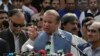 FILE - Nawaz Sharif addresses a crowd during his visit to a mausoleum of Pakistani poet Mohammad Iqbal on the occasion of Pakistan Independence Day in Lahore, Aug. 14, 2017.
