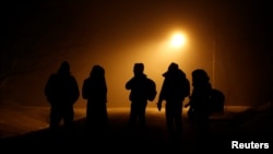 Un groupe de migrants venus de Djibouti et de la Somalie a traversé la frontière des Etats-Unis à Emerson, Manitoba, Canada, 27 mars 2017.