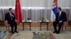 Serbian President Aleksandar Vucic, right, speaks with visiting Chinese Foreign Minister Wang Yi during a meeting at the Serbia Palace in Belgrade, Oct. 28, 2021.