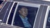 Impeached South Korean President Yoon Suk Yeol sits in a car as he heads to a detention center in Uiwang, South Korea, Jan. 15, 2025. 