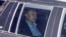 Impeached South Korean President Yoon Suk Yeol sits in a car as he heads to a detention center in Uiwang, South Korea, Jan. 15, 2025. 