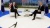 FILE - NATO Secretary-General Jens Stoltenberg speaks with U.S. President Joe Biden on the sidelines of a summit at alliance headquarters in Brussels, June 14, 2021. The two will meet again June 12, 2023, at the White House.